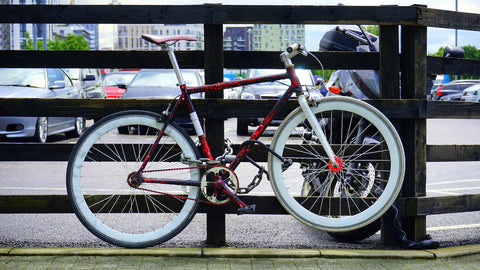 bike locked with bike lock on the street in the urban area